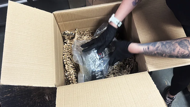 Remanufactured turbocharger being positioned safely in the centre of the box