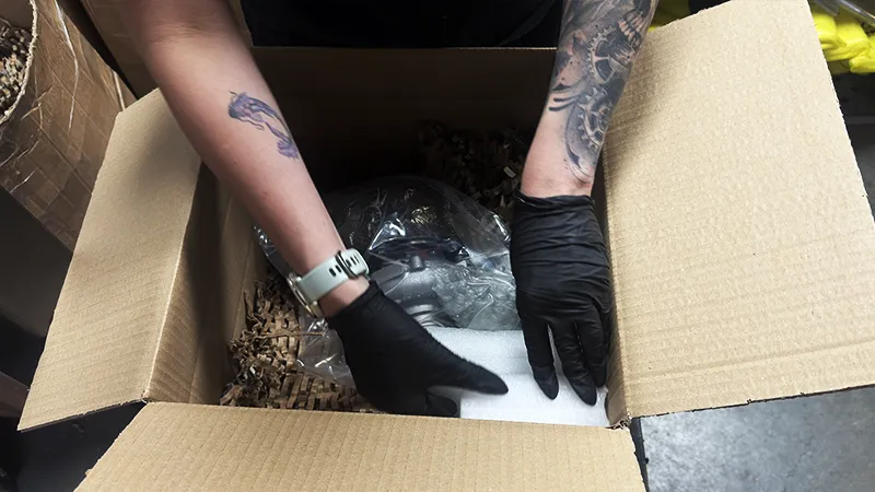 Extra foam cushioning being placed around the turbocharger actuator plug