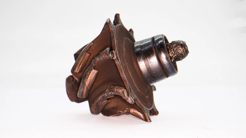Turbocharger compressor blade damage caused by intake debris