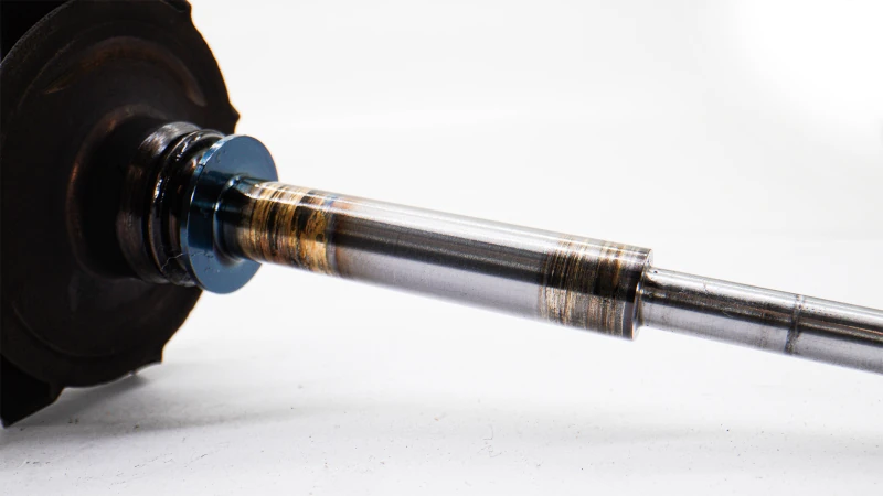 Turbocharger shaft damage showing common turbo failure symptoms and oil contamination