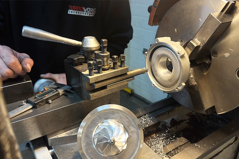 Turbocharger turbine housing machining for performance upgrades